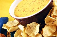 Tortilla chips make an ideal accompaniment to cheesy dips.