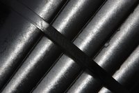 Metal pipes will make for stong table legs that are easy to attach.