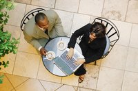 Two people in a business meeting.