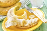 A sliced banana on a plate.