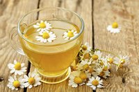 Small cup of chamomile tea.