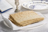 Unleavened bread, called Matzah, on a plate.