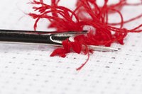 A seam ripper is the ideal tool for removing embroidery stitches.
