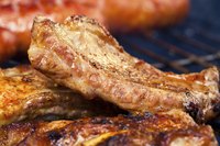 Speed up baby back ribs by parboiling first to tenderize the meat.