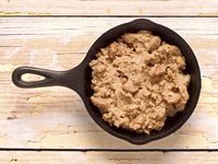 Leftover cooked beans make excellent refried beans.