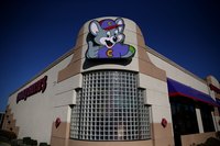 Chuck E. Cheese incorporates kid-friendly food in a gaming atmosphere.