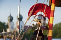 Add red feathers to make your helmet look authentic.