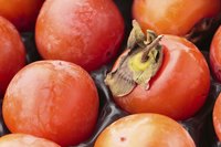 Persimmons for sale at a market.