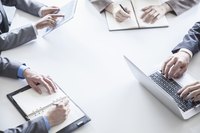 Employees working on reports
