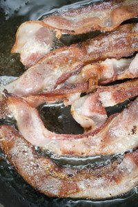 Grease tends to splatter when frying bacon.