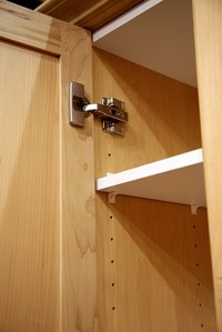 Shelf peg cabinets have adjustable shelves.