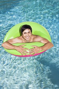 Plywood makes a level base for an inflatable swimming pool.