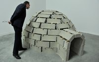 Make a miniature igloo model with ice cubes.