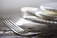 Remove oily residue from your dishes with commercial or natural cleaners.
