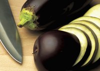 Grill eggplant slices until they are no longer spongy, but before the flesh becomes mushy.