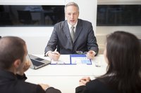 Business accountant talking to employees