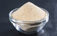 Small bowl of garlic powder.