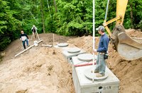 Various septic tank systems suitable for apartment buildings have been developed in the last few years.