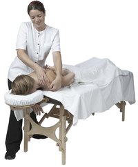 A face cradle pillow props up your head when you receive a massage.