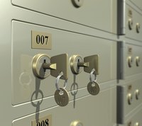 Two keys in a bank lock box.