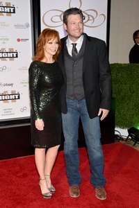 Singer Blake Shelton's jeans -- paired with a vest, tie and blazer -- are right on the money for a semi-formal event.