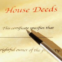 A deed transfers property into the revocable trust.