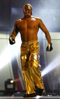 Lucha libre wrestler Rey Mysterio in his distinctive yellow mask.