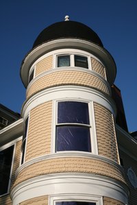 Asphalt roofing shingles curve to conform to rounded or domed roofs.