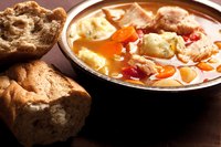 Add canned plum tomatoes to the broth during cooking for extra flavor.