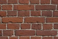 This exterior wall is made of old-style bricks, in a distinctive pattern.