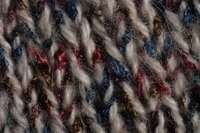 Combine two strands of yarn for interesting color effects when finger knitting.