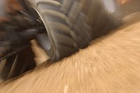 Make a monster truck cake with realistic tire treads and a custom color scheme.