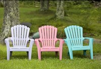 Spray paint plastic chairs that are plain and drab or old and dirty.
