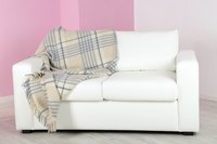 No-sew flannel or fleece blankets make good couch throws for reading or watching TV.