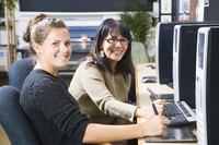 Image of two female workers.