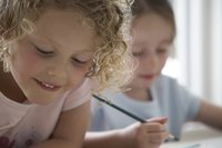 Painting on ceramic tile is a great way for children to create functional artwork.