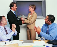 An employee is receiving an award.