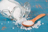 Salt spilled out on the table.