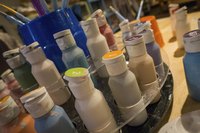 Jars of acrylic paints.