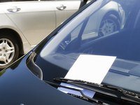 Flyer on windshield of car