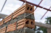 Brick wall being constructed.