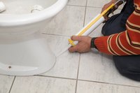 Caulking the base of your AquaSource toilet ensures a watertight seal.