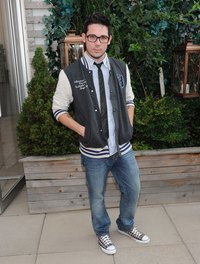 Designer Christopher Straub Wears a varsity jacket to a season premiere of "Project Runway" at the Empire Hotel in New York.