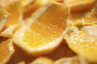 Cut the skin away in strips to "supreme" your oranges.