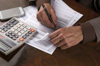 A man is filing taxes.