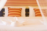 Use netting to enhance an elegant or tropical bedroom atmosphere.