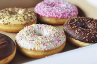 A box of fresh donuts.