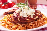 Spaghetti is a popular pasta choice for chicken Parmesan.