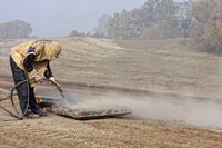 Man using sandblaster