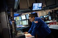 A trader works on the floor of the New York Stock Exchange